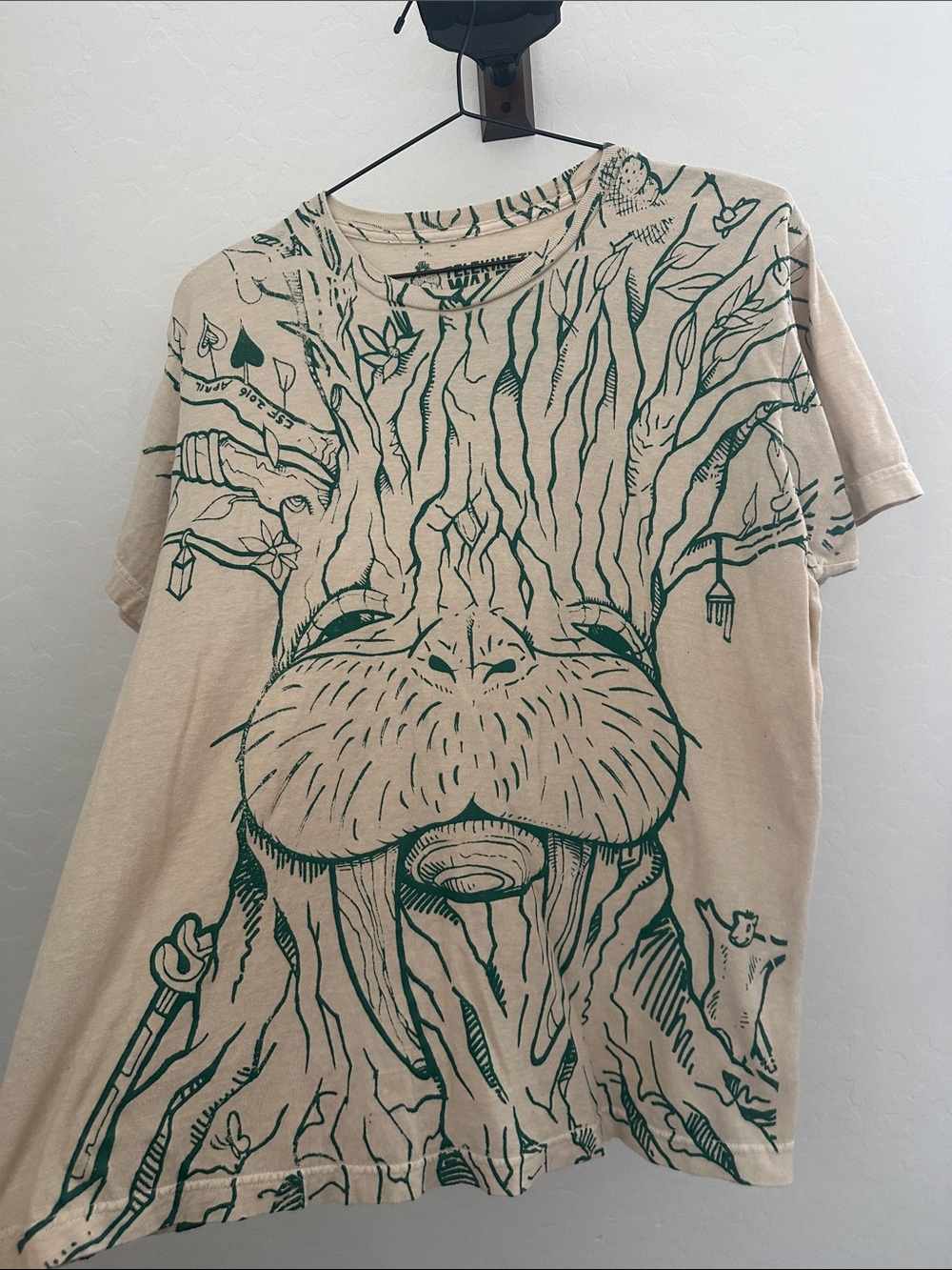 Beige Short-Sleeve Tee with Green Tree Face Graphic